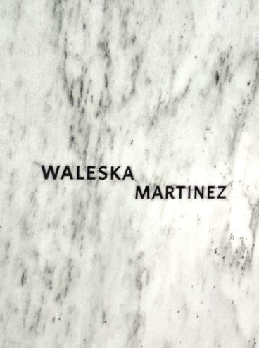 Waleska Martinez's name on a white marble panel of the Wall of Names